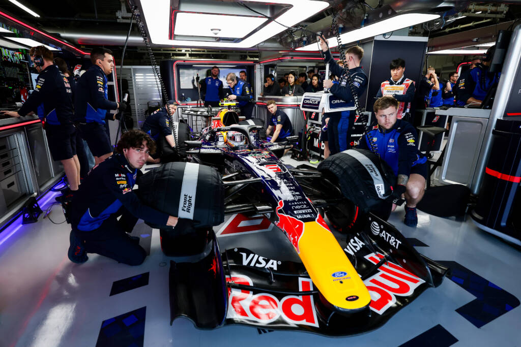 SUZUKA, JAPAN - MARCH 27: Isack Hadjar of France and Oracle Red Bull Racing in the garage with mechanics during practice ahead of the F1 Grand Prix of Japan at Suzuka Circuit on March 27, 2026 in Suzuka, Japan. (Photo by Mark Thompson/Getty Images) // Getty Images / Red Bull Content Pool // SI202603270098 // Usage for editorial use only //