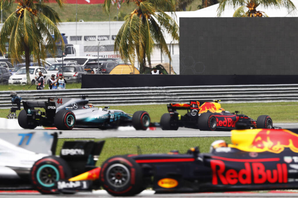 Mercedes and Red Bull cars at the Sepang Circuit during the final Malaysian Grand Prix in 2017