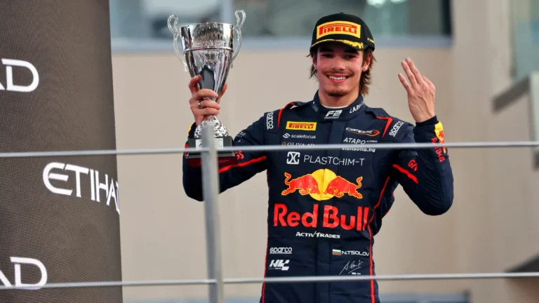 Nikola Tsolov, Red Bull junior driver, holding his FIA Formula 2 trophy in Abu Dhabi during the podium celebrations. 