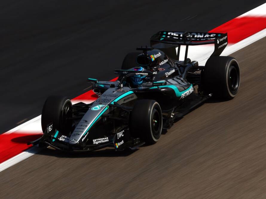 Mercedes Formula 1 car running over a red and white kerb during F1 2026 Bahrein Testing in Sakhir