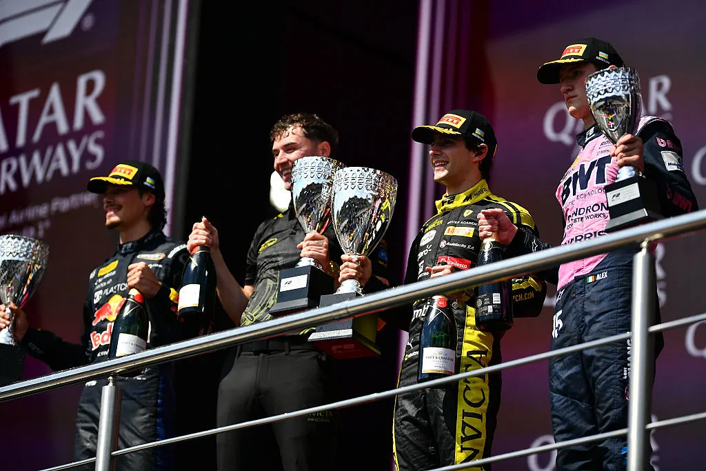Rafael Câmara, Nikola Tsolov and Alexander Dunne on the podium after F2 Feature Race 2 in Baku.
